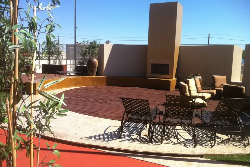 A functional and visually appealing flatwork hardscape in the front view, seamlessly blending with the outdoor landscape.