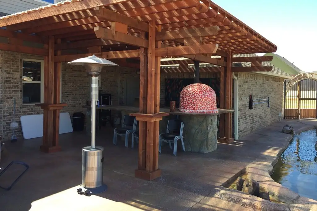 A well-designed flatwork hardscape at the doorway, enhancing the outdoor space with a clean and modern look.